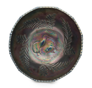 A kiwi bird carnival glass fruit bowl, circa 1920s, a superb and rare example, 13cm high, 22.5cm diameter