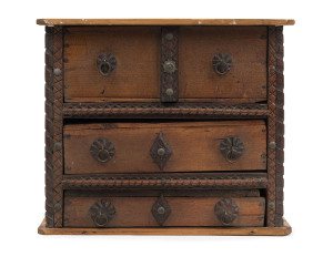 An antique tramp art three drawer miniature chest, cedar and Baltic pine, Barossa Valley, South Australian origin, circa 1890, 28cm high, 33cm wide, 20cm deep