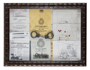 H.M. PRISON PENTRIDGE original main gate key, circa 1853, housed in a framed display with accompanying handcuffs and documentation, signed by the last governor of the prison in 1997, the key 13cm long, the frame 68 x 87cm overall