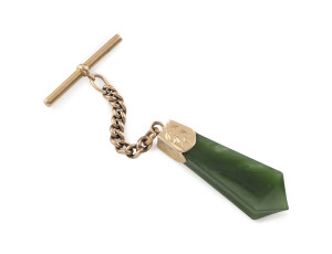 WILLIAM DRUMMOND & CO. 15ct gold and New Zealand greenstone fob, 19th century, stamped "W.D. 15", 9cm high including chain.