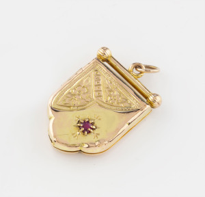 A Colonial twin photo locket, 9ct yellow gold and garnet, late 19th century, 3cm high