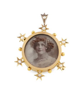 An antique 15ct gold photo portrait pendant set with seed pearls, late 19th century, 4.2cm high
