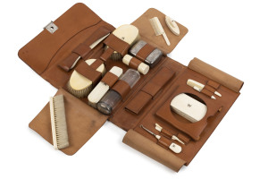 JOACHIM MATTHIAS WENDT (1839-1917) INTEREST: An impressive gentleman's antique travel set, ivory and sterling silver, housed in original tan leather satchel with monogram "J.M.W.". Individual pieces each monogrammed with a "W" or "J.M.W". Satchel 34cm wide. Purchased from Rutherford Antiques, Melbourne with written ownership attribution. PROVENANCE Private collection Perth.