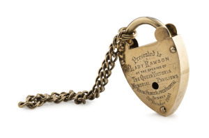 ROYAL PRINCE ALFRED HOSPITAL commemorative Australian silver gilt padlock and chain, engraved "Presented To Lady Rawson At The Opening Of The Queen Victoria Memorial Pavilions, Royal Prince Alfred Hospital, Sydney, 20th October, 1904", stamped "HARDY BROTHERS, SYDNEY, Sterling Silver", 21cm high overall