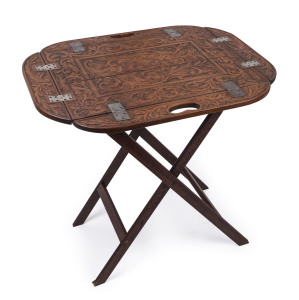 An Australian cedar chip-carved butler's table, 19th century, 75cm high, 75cm wide, 61cm deep