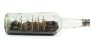 An antique clipper ship in a bottle set in fine diorama harbour scene, 19th century, ​30cm long