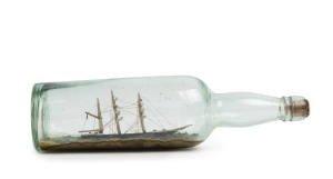 An antique ship in a bottle, 19th century, 31cm long