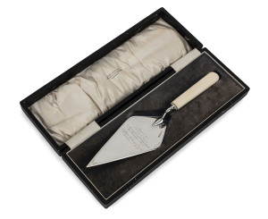 ST. JOHNS LUTHERAN CHURCH sterling silver presentation trowel by HARDY BROTHERS in original plush fitted box, inscribed "Presented To Mrs. T.J. NOSKE On The Occasion Of The Laying Of The Foundation Stone Of St. Johns Lutheran Church Melbourne, Nov. 18th, 1928", 30cm long