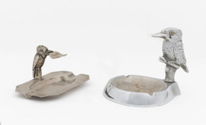 Two kookaburra ashtrays, silver plate and chrome, early to mid 20th century, the larger 10cm high, 12cm wide