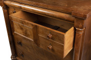 A Colonial huon pine chest of seven drawers, inverted breakfront with full turned columns and cushion moulded long drawer; birdseye huon pine with cedar and huon pine secondary timbers, Tasmanian origin, circa 1850. Note: Unusual drawer configuration. 128 - 2