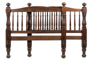 Colonial double bed ends, blackwood and eucalypt, Tasmanian origin, early to mid 19th century, with later iron rails, 122cm high, 132cm wide