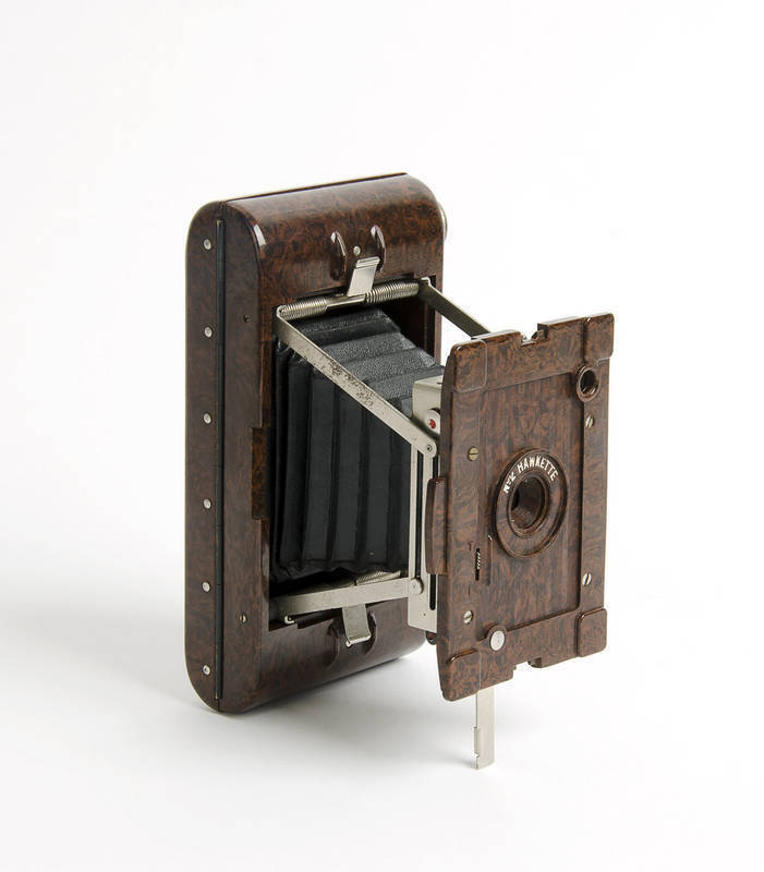 KODAK (British Made): Hawkette Camera No.2, c1930s, brown marbled bakelite folding camera with cross-swinging struts, for 120 rollfilm.