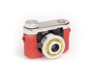 KUNIK (Germany) Mickey Mouse Camera, c1958 sub-miniature for 14x14mm exposures on 16mm Tuxi film. With red hammertone body and meniscus lens in single speed shutter.