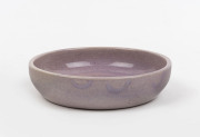 KLYTIE PATE pottery dish with mauve glaze, incised "Klytie Pate", 13cm diameter