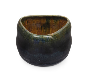MERRIC BOYD pottery vase, triangular form glazed in green, blue and brown, incised "Boyd, 1922" with sgraffito gum leaf, 10cm high, 14cm wide