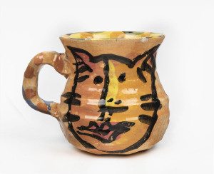 DEBORAH HALPERN hand-thrown pottery mug with painted cat decoration, signed "D.D.H", 10cm high, 13cm wide