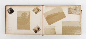 A small cloth-bound photograph album, with handwritten presentation dated 1903; containing numerous small format photographs depicting a farming family and their activities. Including ladies riding bicycles, horse & cart, the local preacher, visiting wild