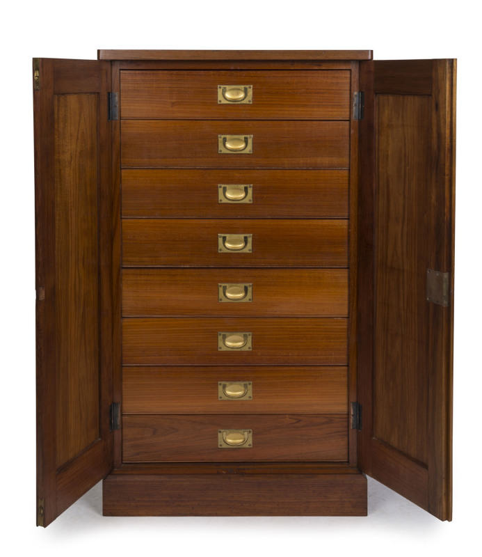 An antique Australian blackwood solicitor's stationery cabinet with two doors revealing eight drawers, late 19th century, 109cm high, 60cm wide, 55cm deep