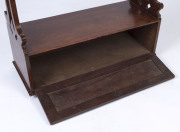 A Colonial newspaper rack with cabinet base and steel caster, Australian cedar, circa 1880. Part of the original furnishings from RUPERTSWOOD in Victoria. 98cm high, 83cm wide, 33cm deep - 2