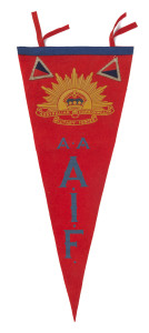 WORLD WAR I: Australian Commonwealth Military Forces Rising Sun pennant in felt (length 62cm), HMS Achilles cap band, Rising Sun cap badges (3), 'AUSTRALIA' (2) & 'AWAS (2) shoulder badges, uniform buttons large (4) & small (8), plus 'For King and Empire/Services Rendered' and 'Returned from Active Service' badges and two felt sew-on patches. (25 items)