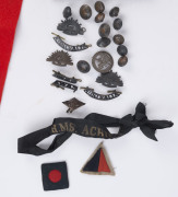 WORLD WAR I: Australian Commonwealth Military Forces Rising Sun pennant in felt (length 62cm), HMS Achilles cap band, Rising Sun cap badges (3), 'AUSTRALIA' (2) & 'AWAS (2) shoulder badges, uniform buttons large (4) & small (8), plus 'For King and Empire - 3