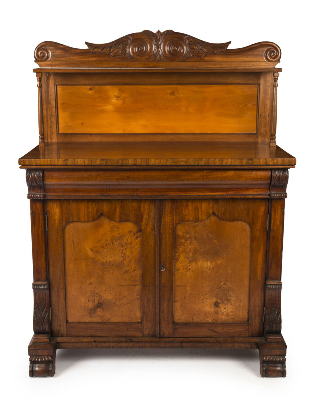 A fine cedar and birdseye huon pine two door chiffonier with Thomas Hope scroll back with single shelf, the base with single ogee moulded fitted cutlery drawer above finely figured huon pine shield panel doors, Tasmanian origin, circa 1845, 148cm high, 11