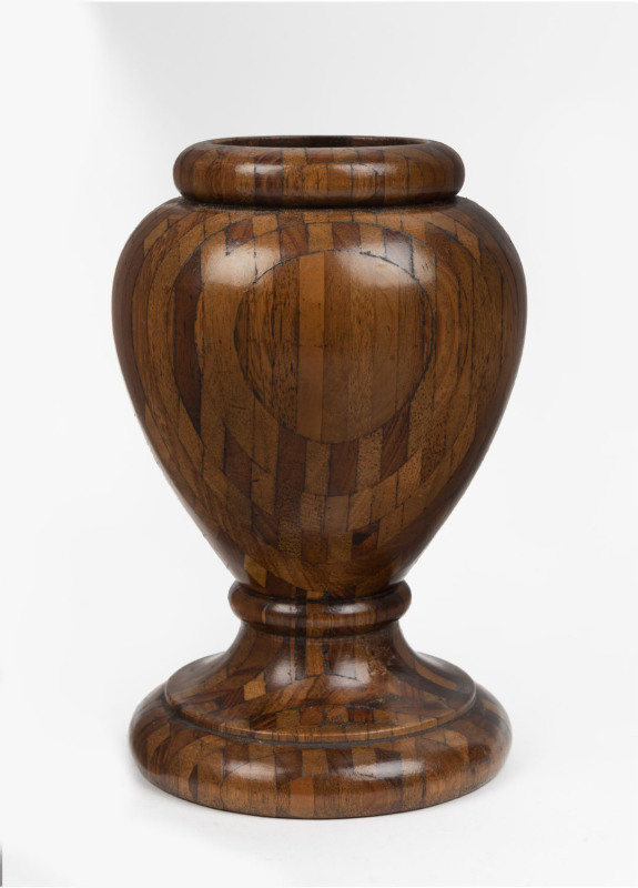An antique Australian specimen timber turned mantel urn, late 19th century, 18cm high