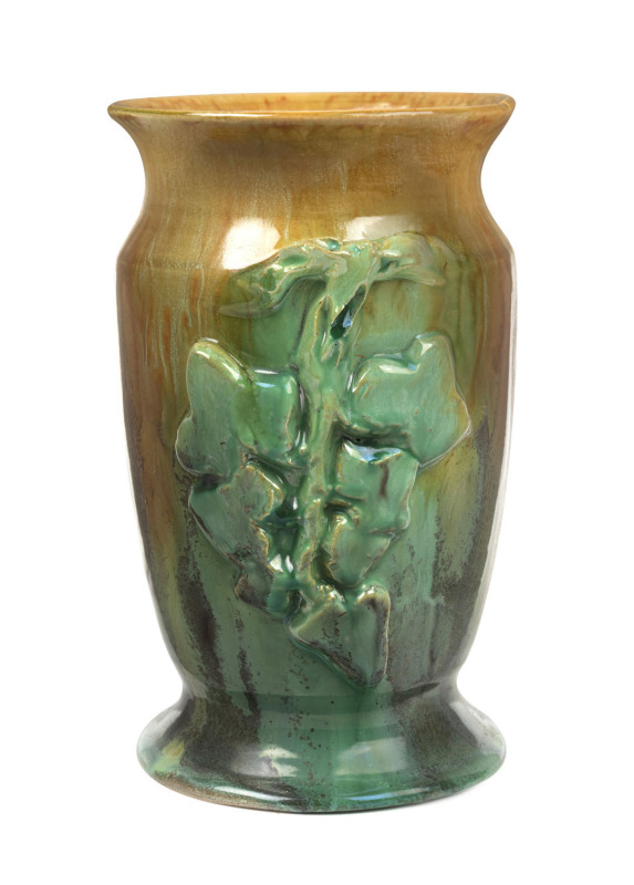 UNA DEERBON pottery vase with applied vine leaves, signature obscured by glaze, 18cm high