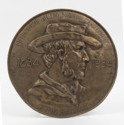 JOHN BATMAN "Melbourne & Victorian Centenary 1834-1934" handmade repouss&eacute; circular brass wall plaque, diameter 27cm
