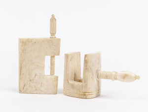 Two antique whalebone clamps, 19th century, 6cm and 6.5cm high