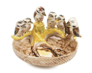 SEVEN LITTLE AUSTRALIANS Japanese porcelain kookaburra bowl, mid 20th century, with original foil label "Halltonware", stamped "Japan", 10cm high, 16cm wide