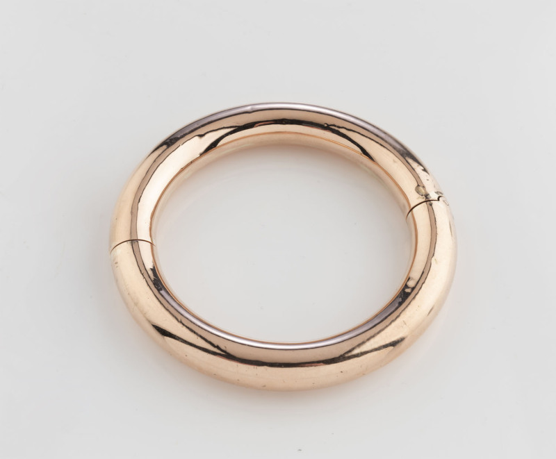 An antique 9ct rose gold wax filled bangle, late 19th century, 8cm diameter, internal 5.8cm diameter