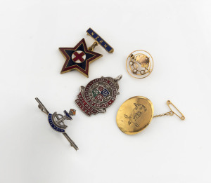 A map of Australia 9ct gold and seed pearl brooch, a gold plated oval kookaburra brooch, together with three enamel and silver badges, 19th and early 20th century, (5 items)