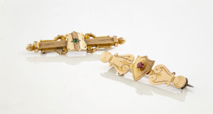 ARONSON & Co.of Melbourne antique 9ct gold bar brooch set with green stones, late 19th century; together with a WILLIS & SONS 9ct gold bar brooch set with a red stone, 19th century, (2 items), 4.5cm wide, 5 grams total