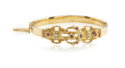 WILLIS & SONS fine antique bangle, 15ct yellow gold with crescent and star design set with red stones and seed pearls, 19th century, stamped "15,W." with unicorn mark, ​6.5cm wide, 10.6 grams total