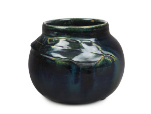 CHARLES DREW pottery vase with applied gum leaf decoration, incised "Charles Drew", 10cm high, 12cm wide
