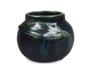 CHARLES DREW pottery vase with applied gum leaf decoration, incised "Charles Drew", ​10cm high, 12cm wide