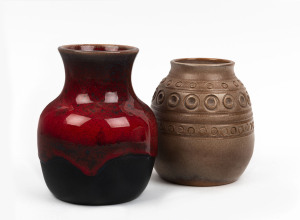 ERIC JUCKERT red glazed retro pottery vase together with a brown glazed vase with circular motif, both incised "Eric Juckert", 14cm and 12cm high