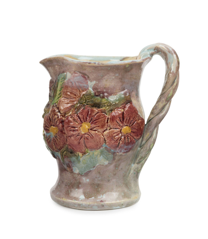 UNA DEERBON pottery jug with applied floral and butterfly decoration, incised "Deerbon", 13cm high