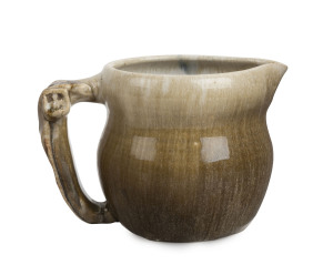 MERRIC BOYD pottery jug with gumnut and gum leaf handle, incised "Handcraft, Boyd, 1925", 12cm high, 18cm wide
