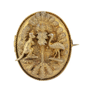 A stunning Australian yellow gold memorial locket brooch adorned with kangaroo and emu in fern foliage, 19th century, 3.7cm high, 12.3 grams total
