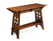 An Australian Arts & Crafts occasional table, solid blackwood with peg construction, early 20th century, 77cm high, 108cm wide, 44cm deep