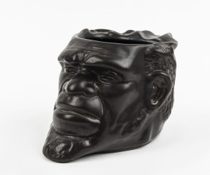 WEMBLEY WARE Australiana character jug, stamped "Australian Native, Wembley Ware, Olympics 1956", 10cm high, 17cm wide