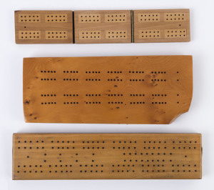 Three assorted cribbage boards including solid huon pine and folding example, 20th century, ​the largest 30cm wide