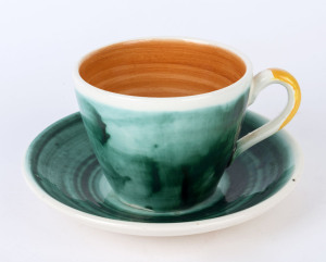 ARTHUR MERRIC BOYD pottery teacup and saucer, incised "A. M. Boyd", 16cm diameter