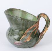 OPPERMAN (HARVEY SCHOOL) green glazed pottery jug with applied gum leaves and branch handle, incised "Hand Built. Opperman, 1937", ​10cm high, 13cm wide - 2