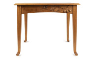 ROBERT PRENZEL centre table, Queensland maple with carved gumnuts, leaves, blossoms and branches on four sides, early 20th century, 74cm high, 92cm wide, 58cm deep - 2