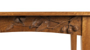 ROBERT PRENZEL centre table, Queensland maple with carved gumnuts, leaves, blossoms and branches on four sides, early 20th century, 74cm high, 92cm wide, 58cm deep - 5