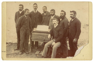 Albumen print, (10 x 15cm; lacking lower right corner) affixed to card, with handwritten document affixed verso: "The Point McLeay (Native) Glee Club, which sang in the Adelaide Town Hall at a meeting of the S.A. Natives Association, presided over by His 