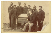 Albumen print, (10 x 15cm; lacking lower right corner) affixed to card, with handwritten document affixed verso: "The Point McLeay (Native) Glee Club, which sang in the Adelaide Town Hall at a meeting of the S.A. Natives Association, presided over by His